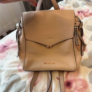Michael Kors Pebbled Leather Pink Backpack with Gold Hardware